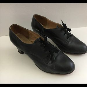 Dance shoes. Black leather and leather soles.